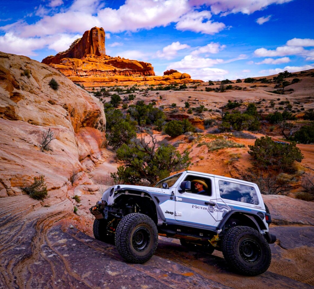 Storm, a white 2021 Jeep Wrangler, photo 12 of 12