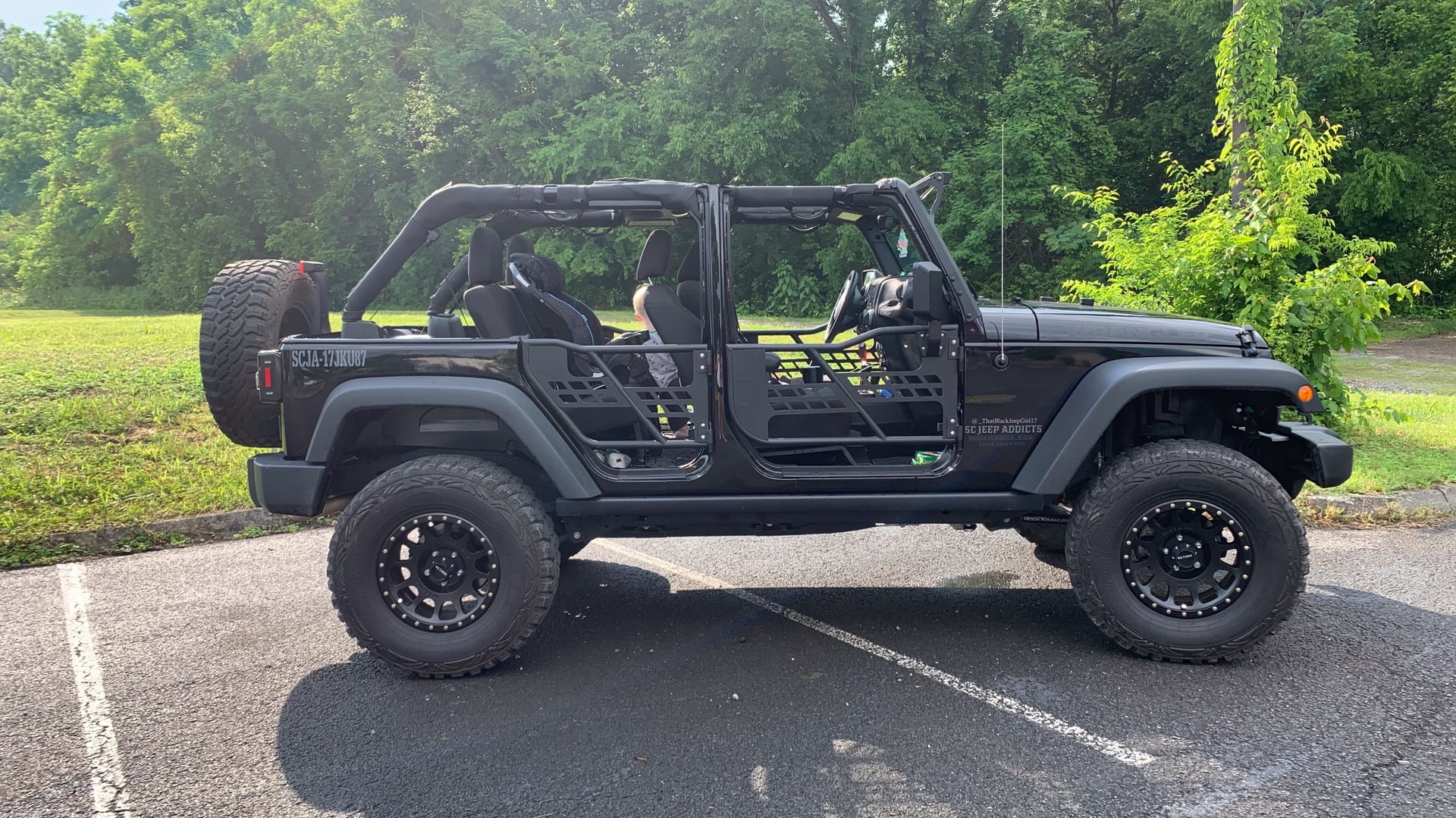 that black jeep girl 17, a black 2017 Jeep Wrangler on 35-inch tires with a 3.5-inch lift, photo 12 of 15