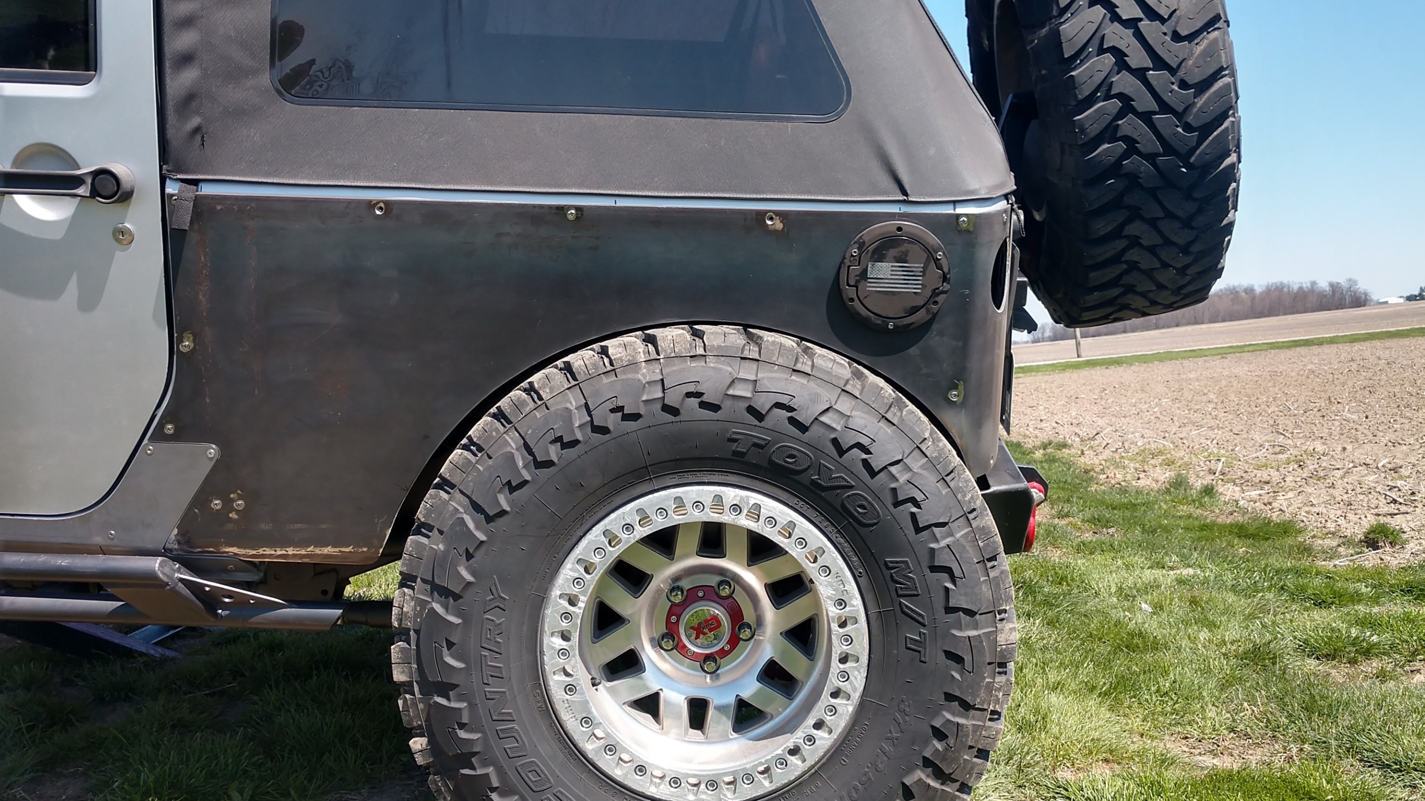 tarnish, a white 2008 Jeep Wrangler JK on 37-inch tires lifted, photo 26 of 28