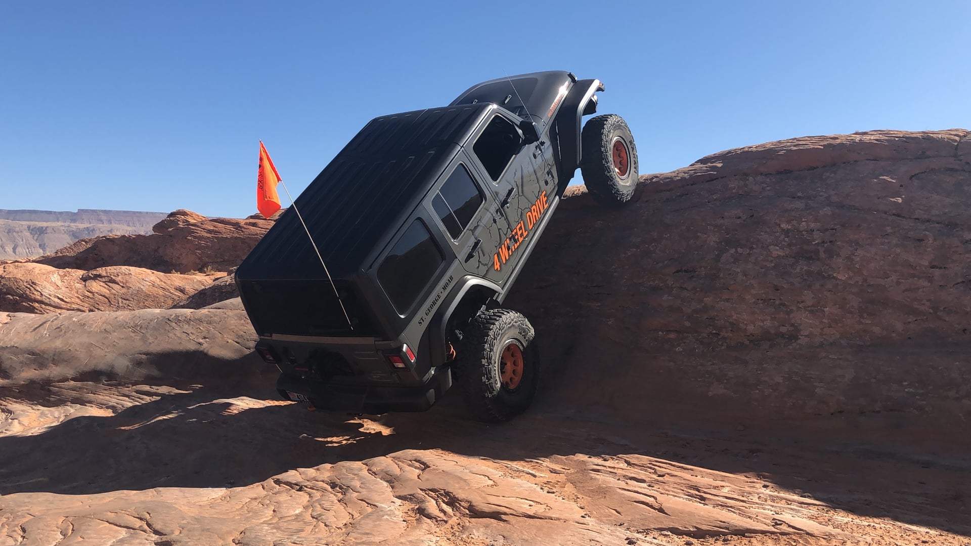 Dixie JL#2 Sporticon, a black 2019 Jeep Wrangler JLU on 39-inch tires, photo 11 of 12