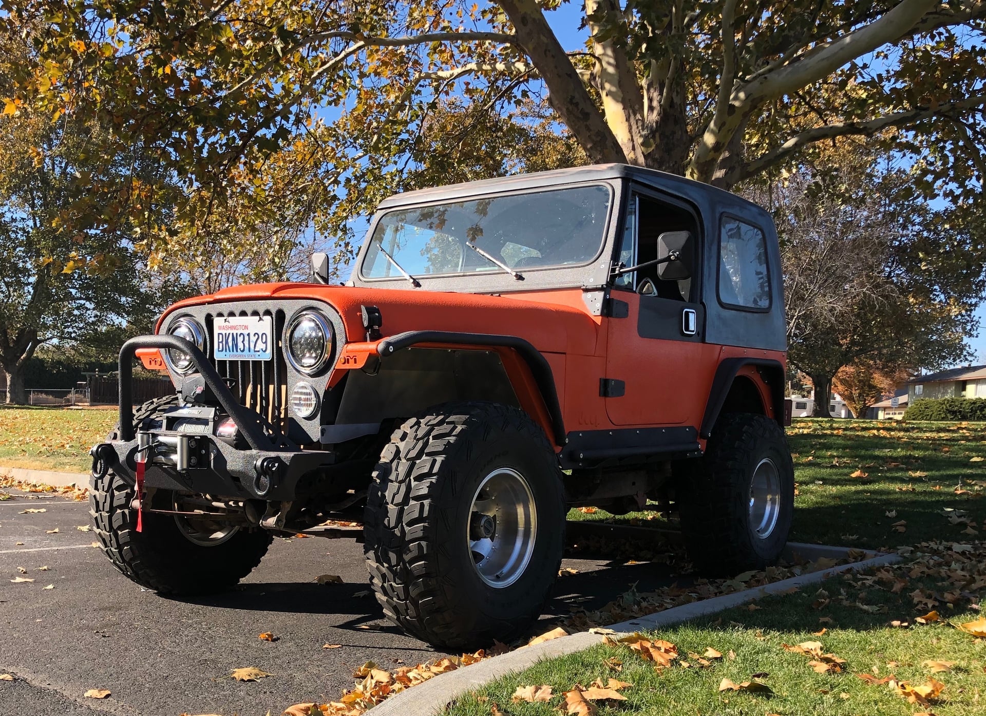 Rowdy, a brown 1984 Jeep CJ-7, photo 10 of 23