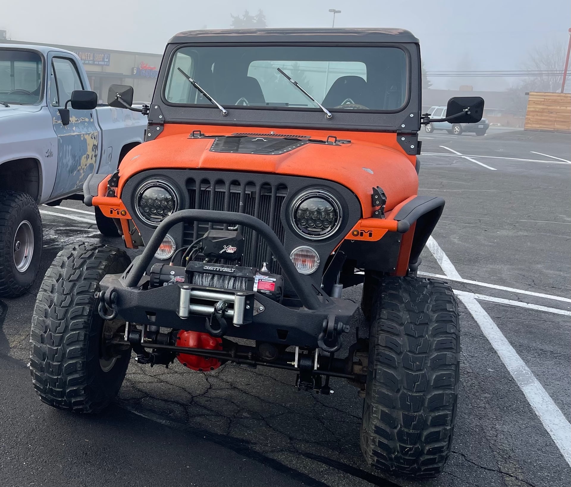 Rowdy, a brown 1984 Jeep CJ-7, photo 20 of 23