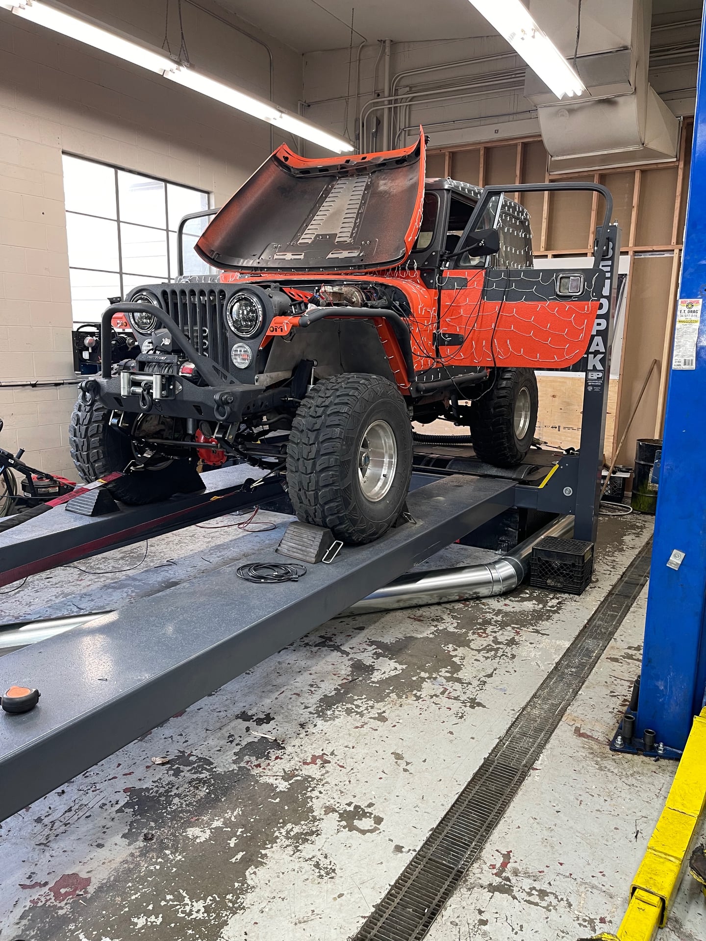 Rowdy, a brown 1984 Jeep CJ-7, photo 21 of 23