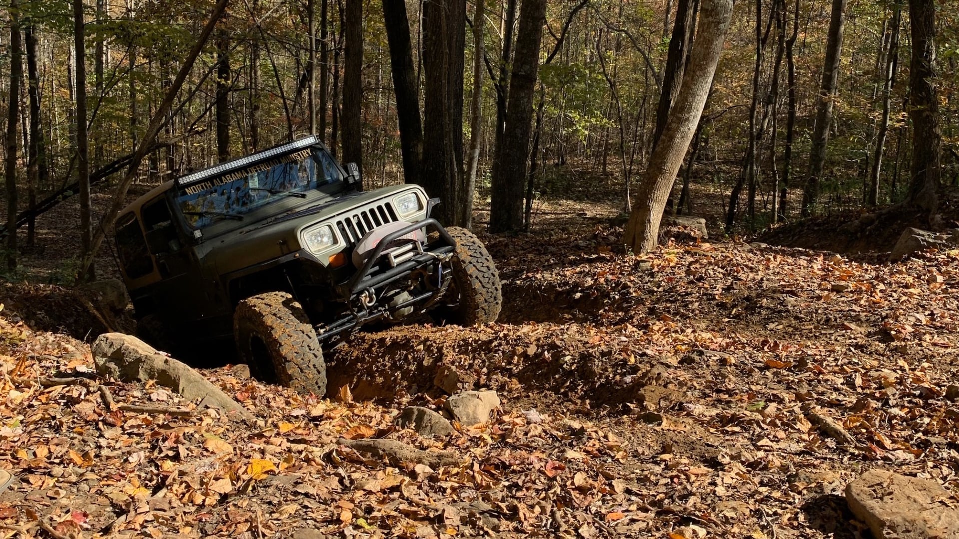 MissionControl, a green 1995 Jeep Wrangler YJ on 40-inch tires with a 4.5-inch lift, photo 10 of 12