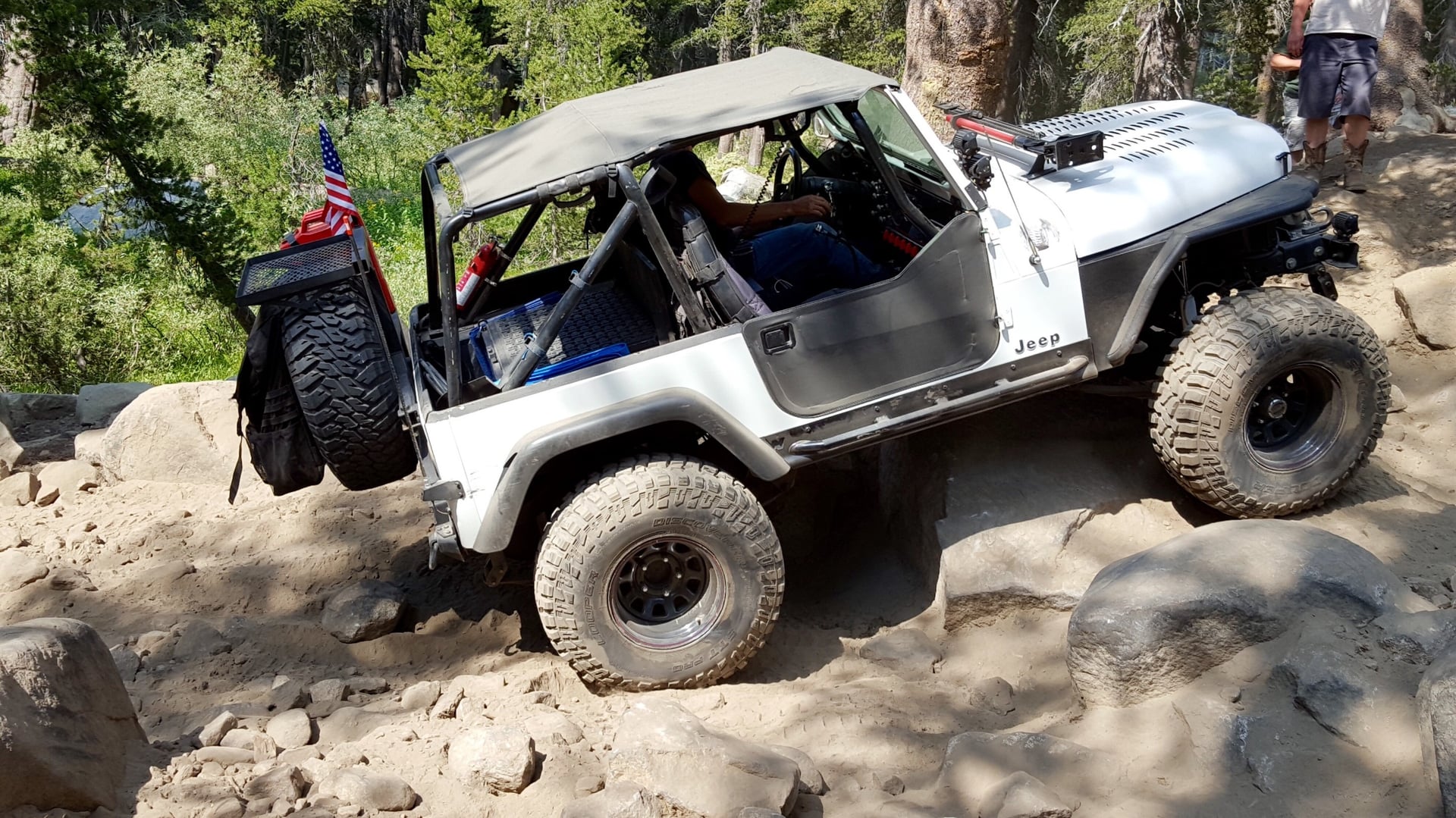 RNIN WLD, a blue 1984 Jeep CJ-7 on 35-inch tires with a 4.5-inch lift, photo 14 of 19