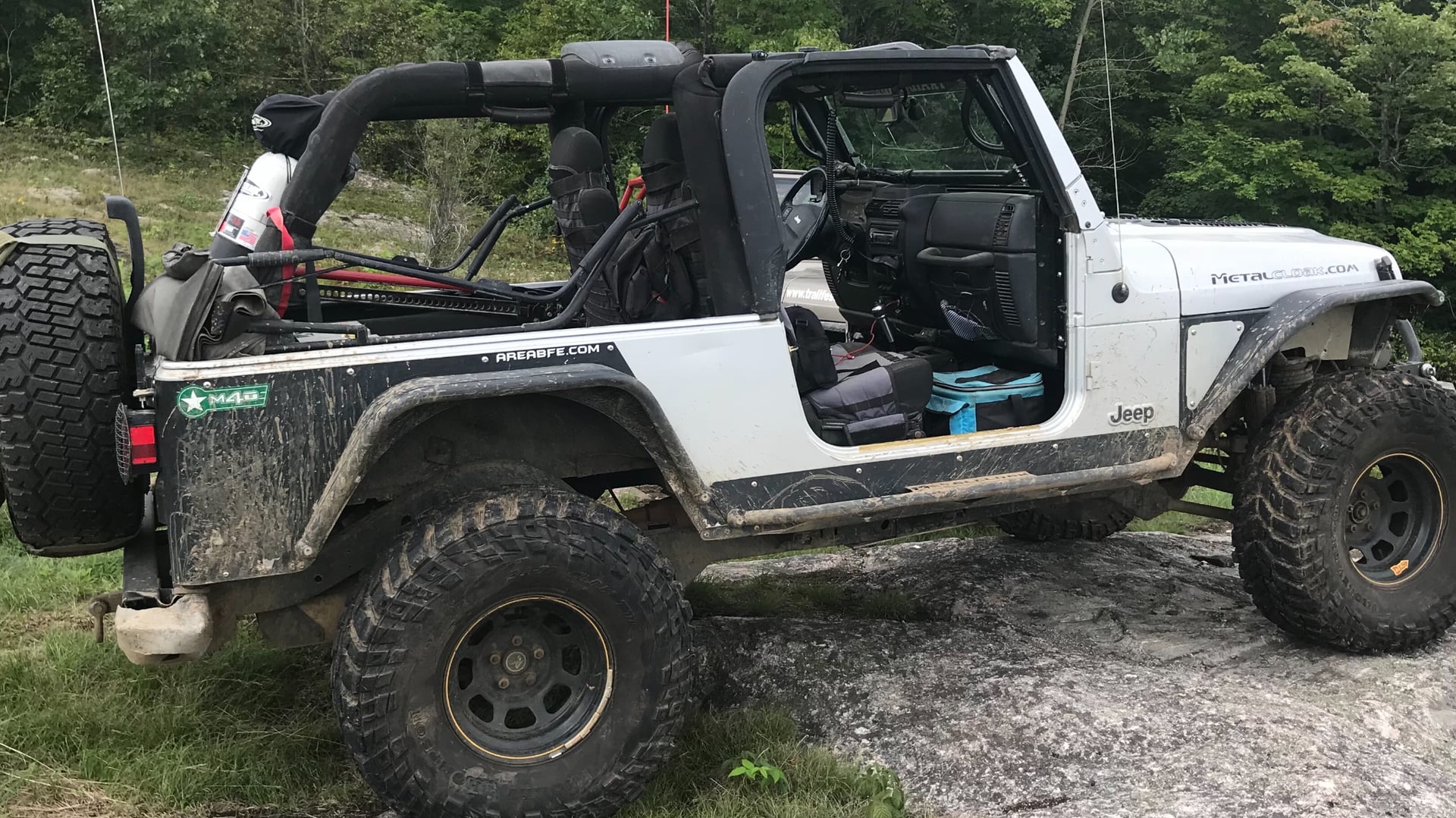 CloakedLJ, a white 2004 Jeep Wrangler LJ on 35-inch tires with a 3.5-inch lift, photo 13 of 16