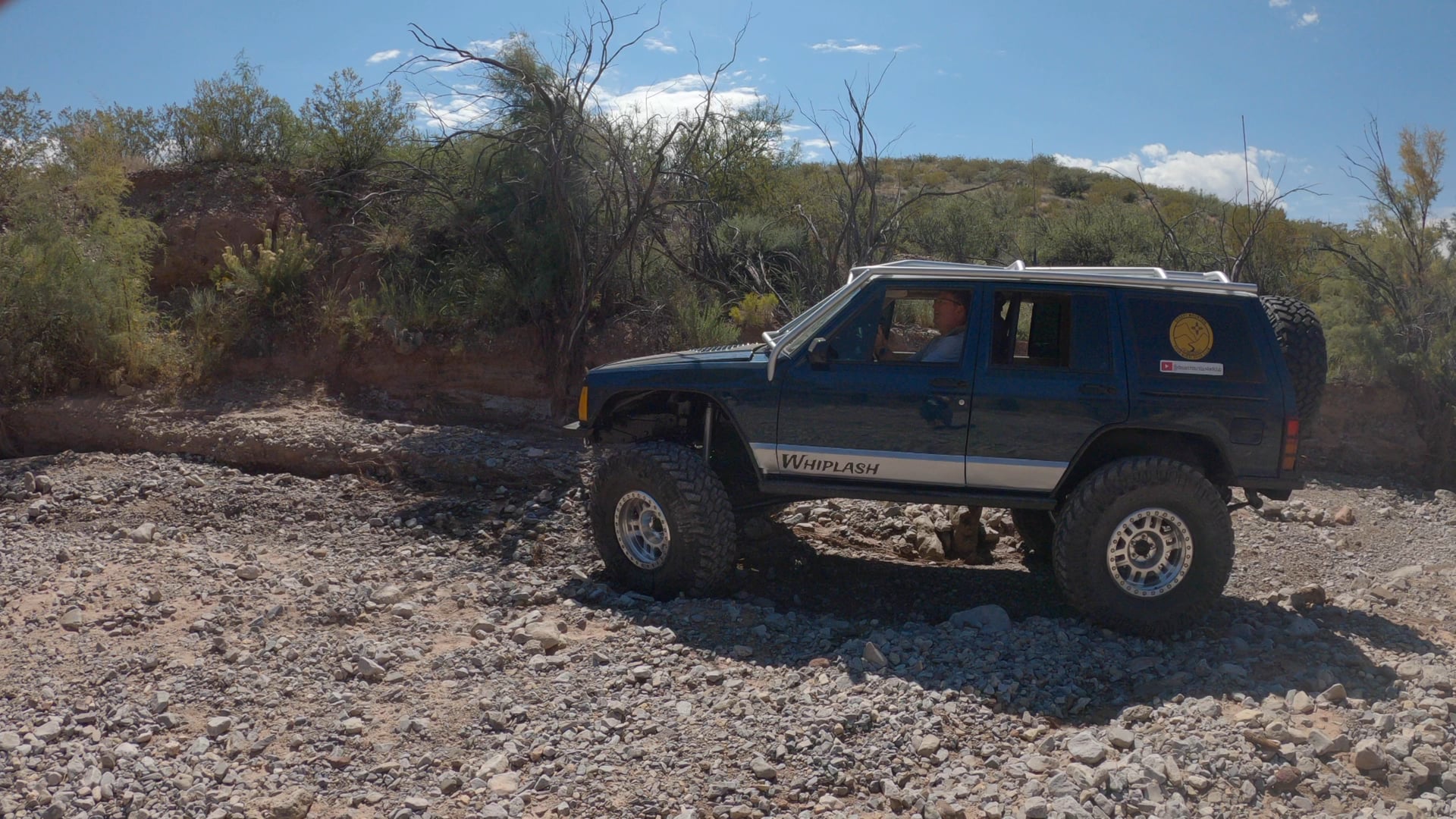 Whiplash, a blue 1996 Jeep Cherokee on 38-inch tires with a 8-inch lift, photo 27 of 27