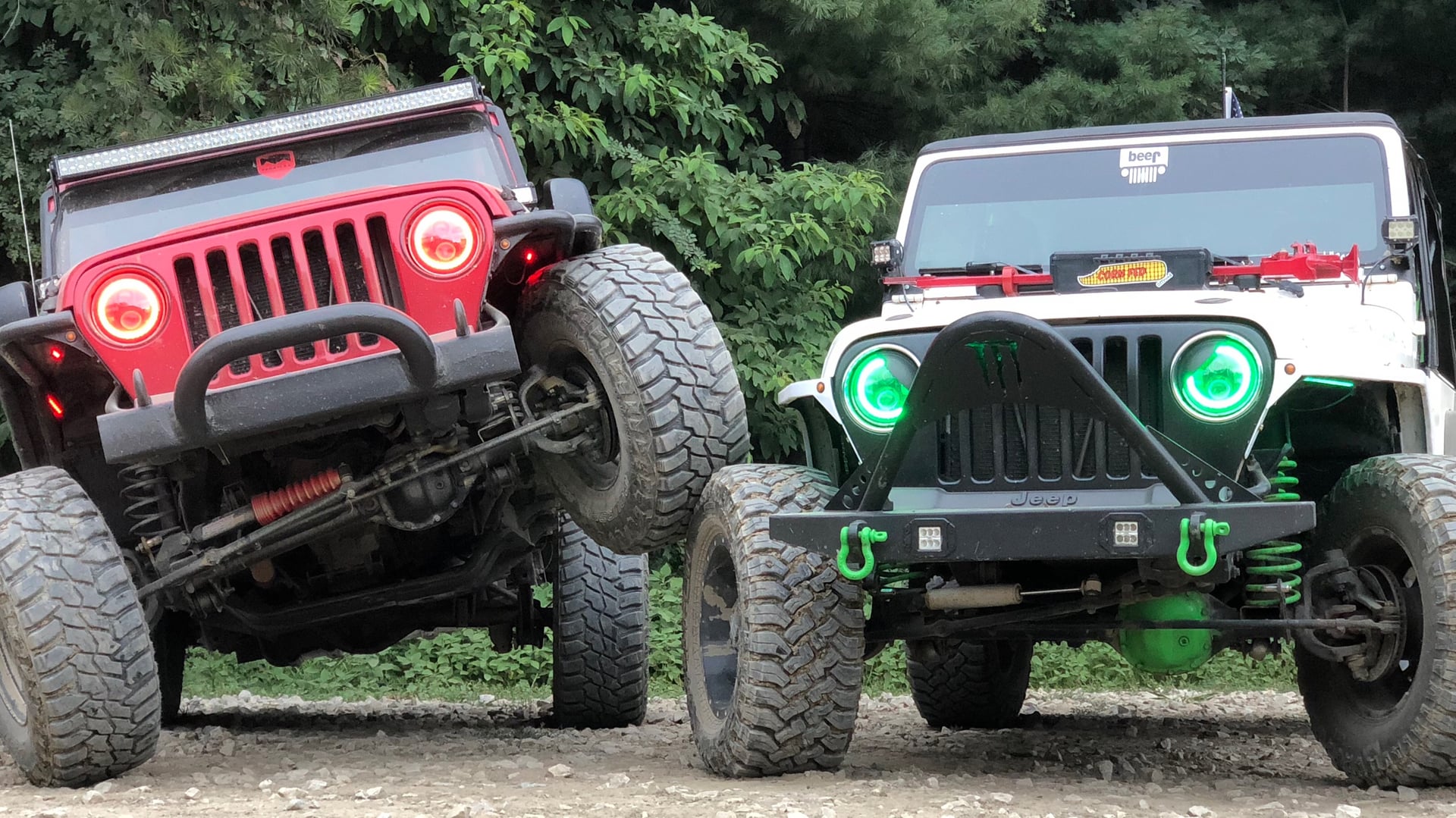 Red Rangler, a red 2006 Jeep Wrangler TJ on 33-inch tires with a 2.5-inch lift, photo 22 of 26