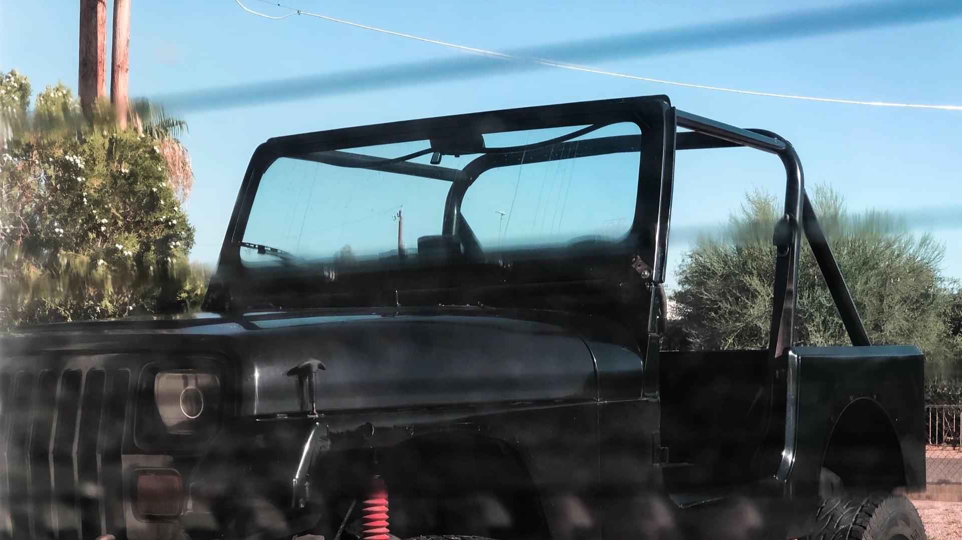 Shadow, a black 1988 Jeep Wrangler YJ with a 4.5-inch lift, photo 14 of 23