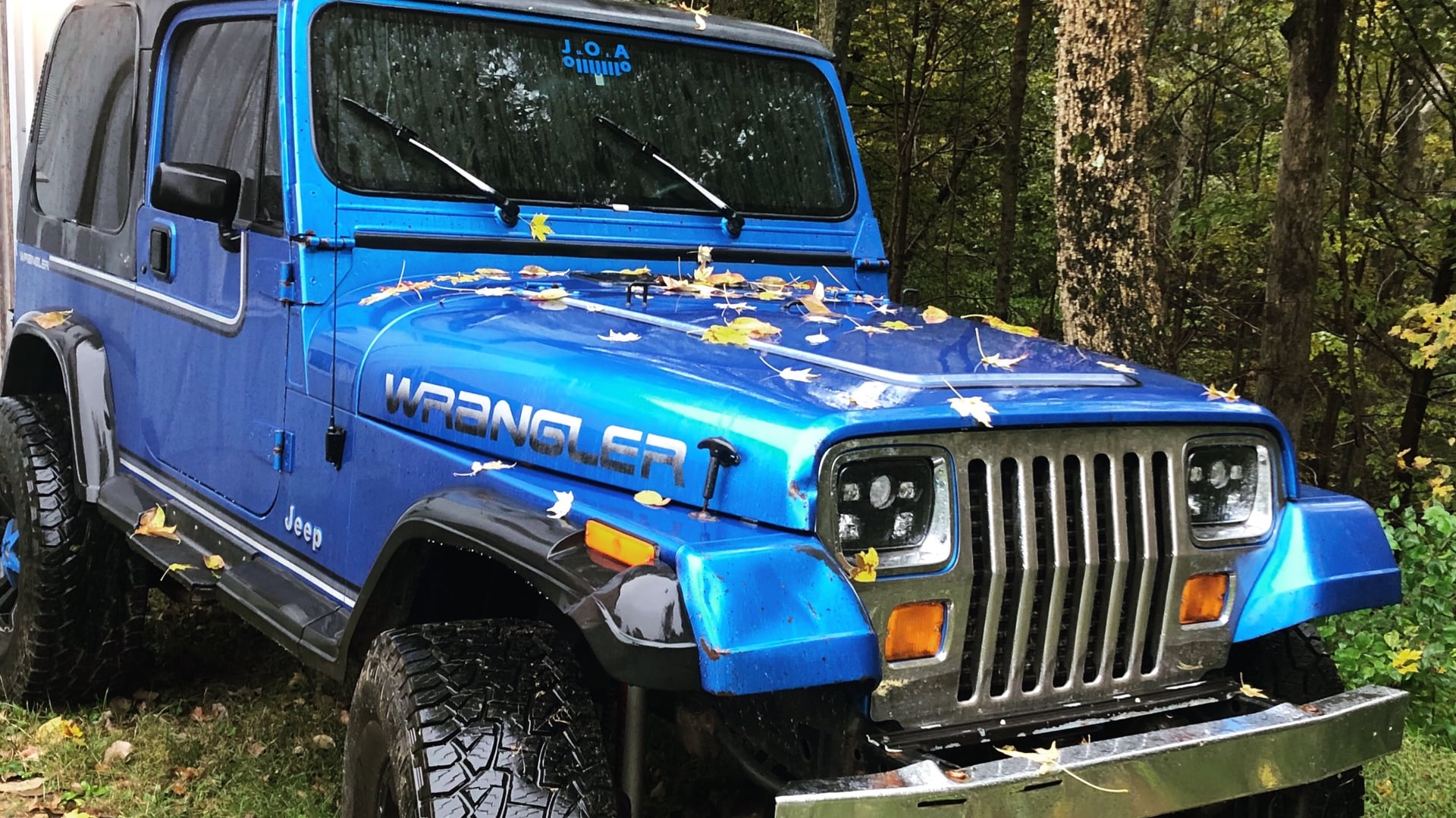 Keith, a blue 1992 Jeep Wrangler YJ on 33-inch tires with a 4-inch lift, photo 10 of 10
