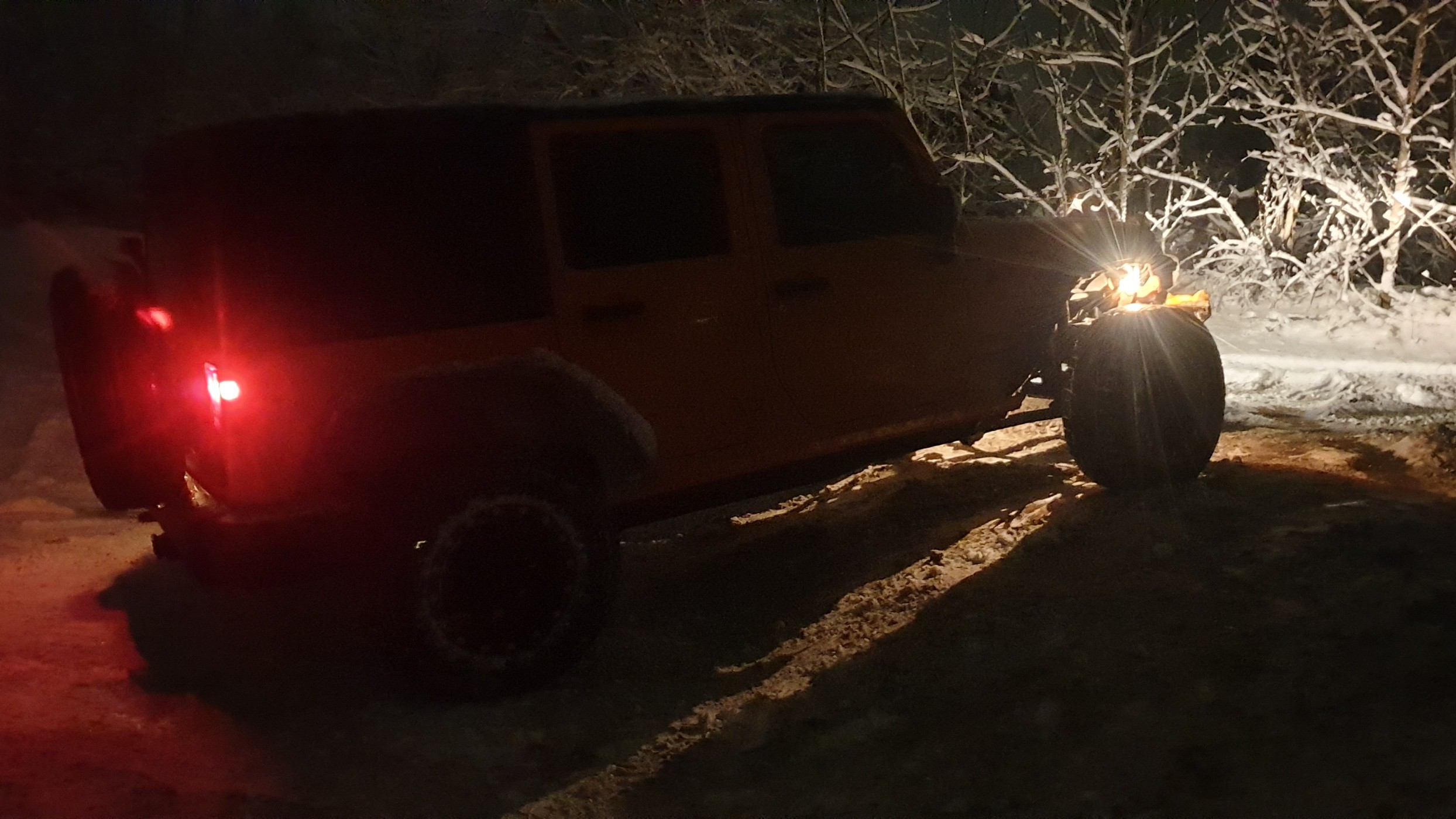 Krawler Of Christ, an orange 2012 Jeep Wrangler JKU on 38-inch tires with a 3.5-inch lift, photo 30 of 30