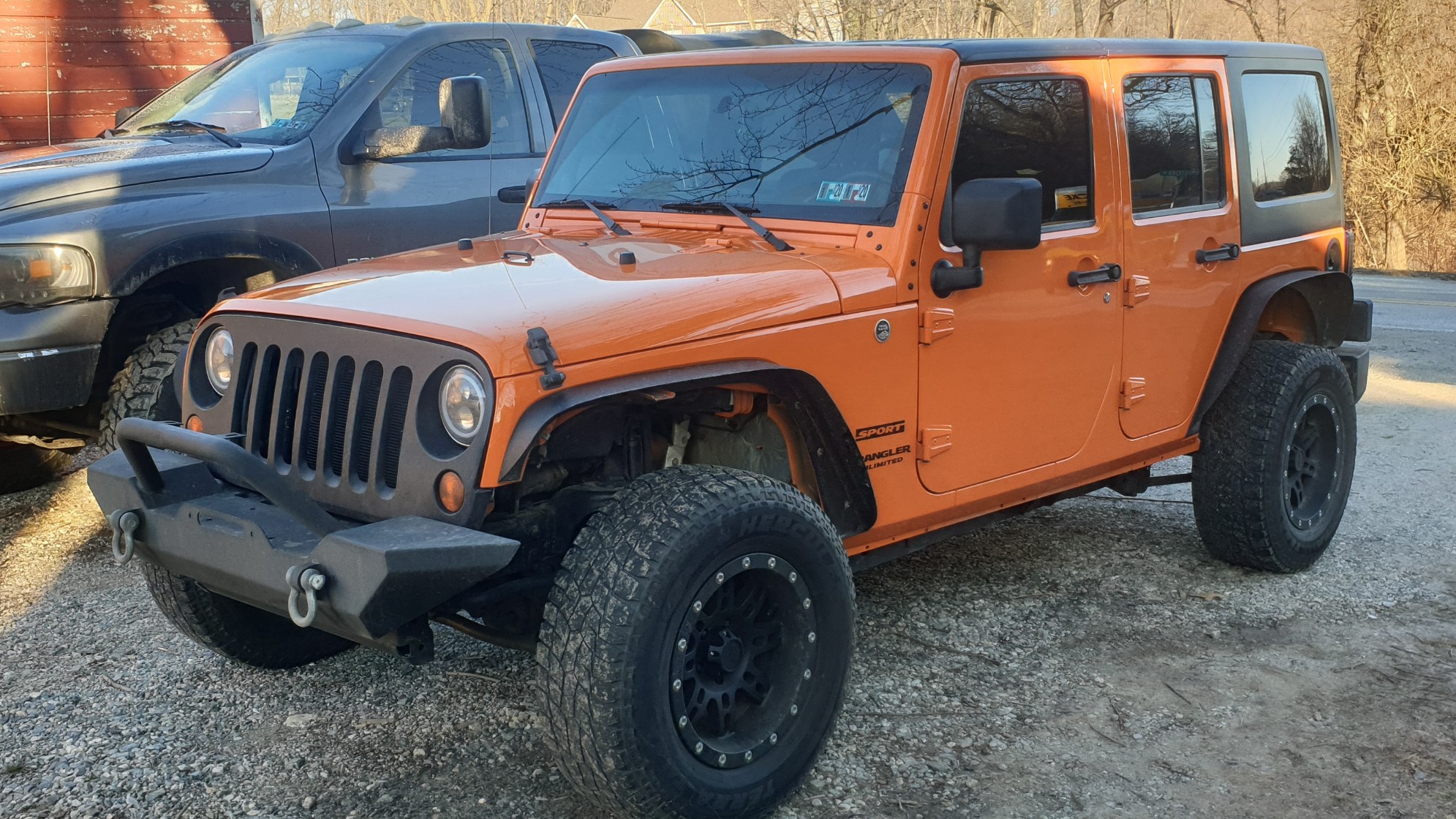 Krawler Of Christ, an orange 2012 Jeep Wrangler JKU on 38-inch tires with a 3.5-inch lift, photo 27 of 30