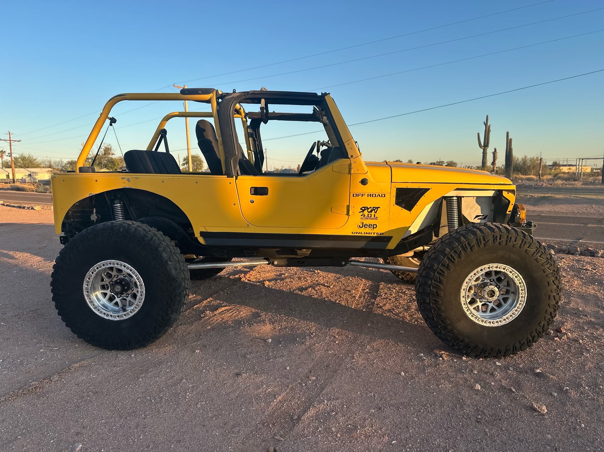 ewdirtlj, a yellow 2004 Jeep Wrangler LJ, photo 32 of 34