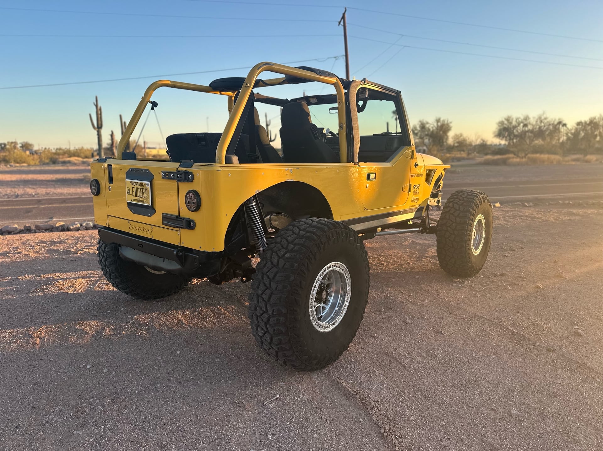 ewdirtlj, a yellow 2004 Jeep Wrangler LJ, photo 33 of 34