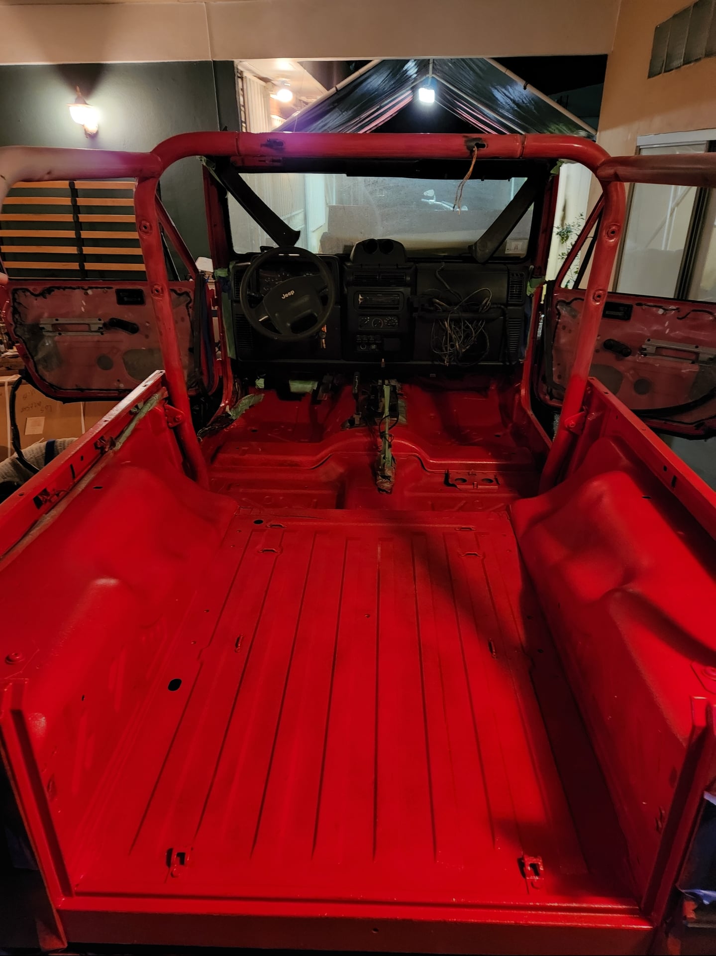 Gossamer, a red 2006 Jeep Wrangler LJ on 43-inch tires, photo 14 of 18