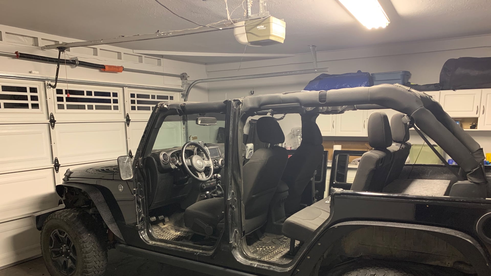 GhostDrummer, a black 2018 Jeep Wrangler JKU, photo 10 of 14