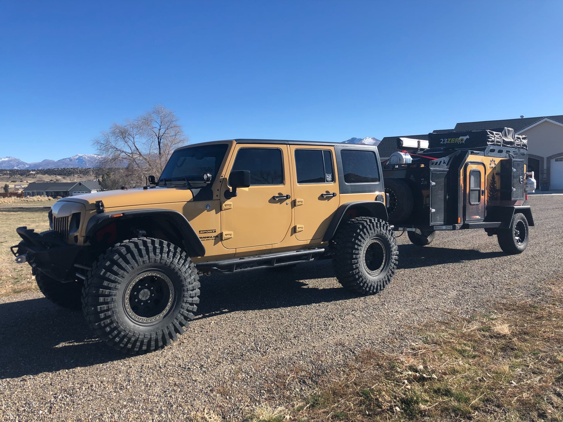 Sully's 1 Ton JKU, a tan 2014 Jeep Wrangler JKU on 40-inch tires, photo 12 of 12