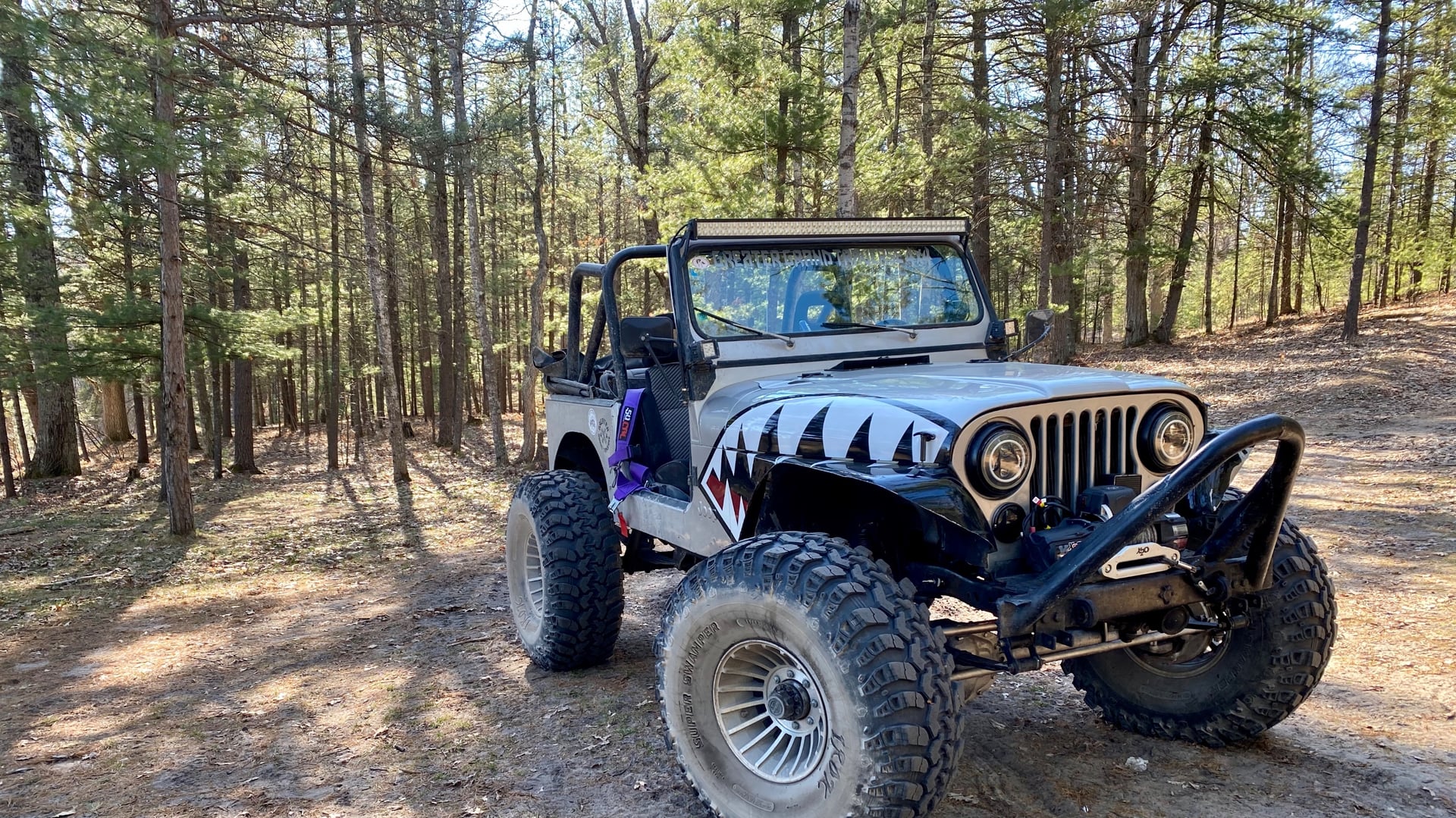 Miss Behavin’, a multi-color 1983 Jeep CJ-7 on 42-inch tires, photo 31 of 31