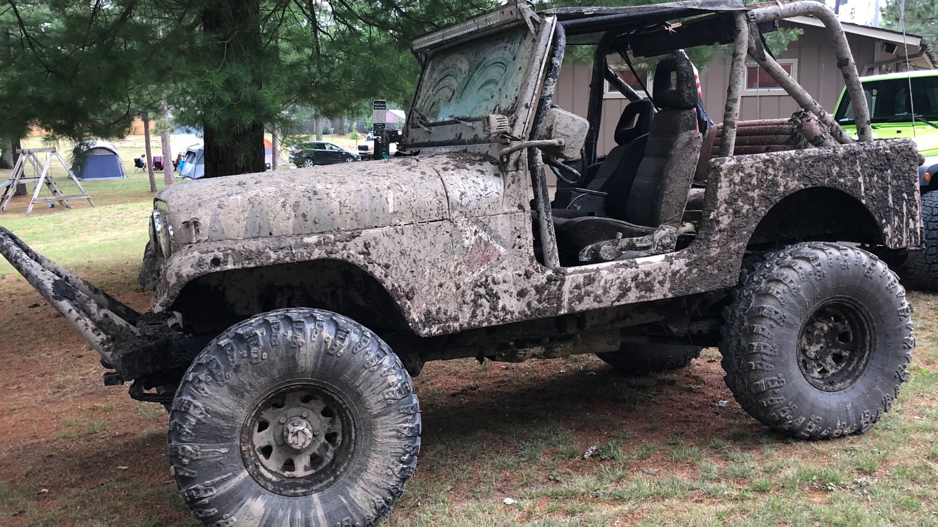 Miss Behavin’, a multi-color 1983 Jeep CJ-7 on 42-inch tires, photo 20 of 31