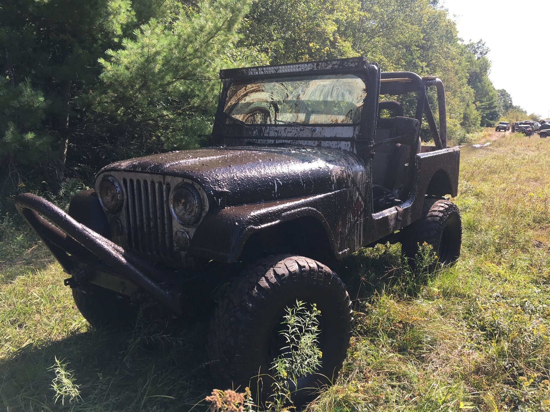 Miss Behavin’, a multi-color 1983 Jeep CJ-7 on 42-inch tires, photo 13 of 31