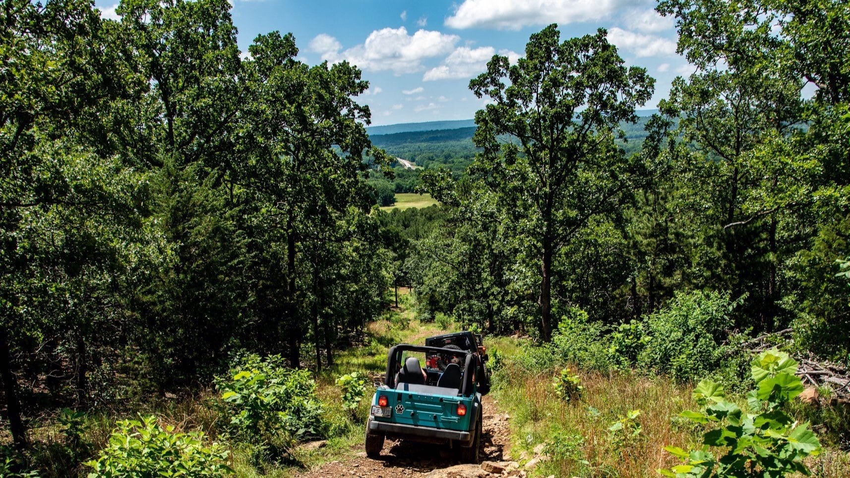Pebble_Crawler, a blue 1997 Jeep Wrangler TJ with a 2.5-inch lift, photo 13 of 13