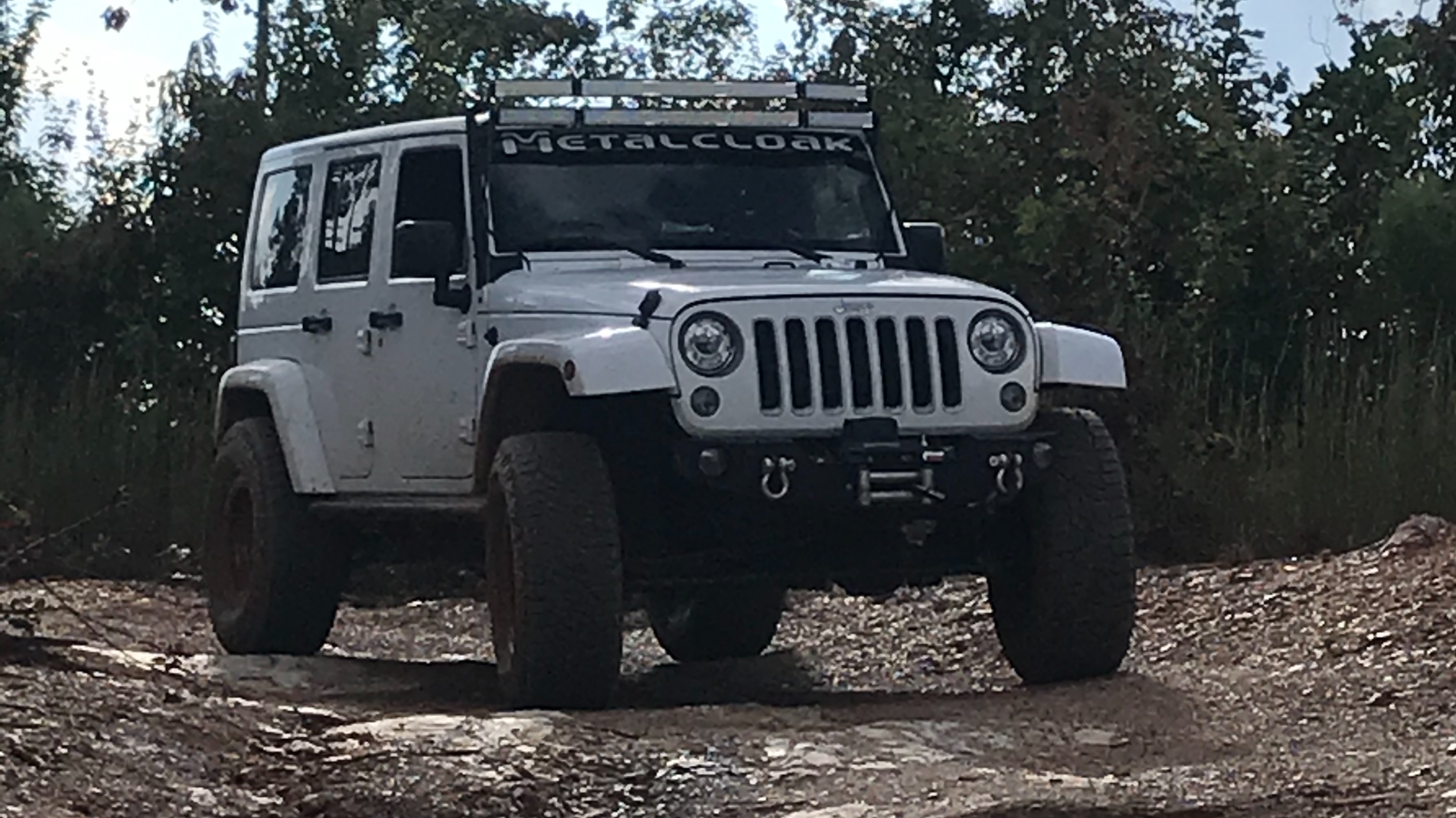 Jeep JKU, a white 2018 Jeep Wrangler JKU on 35-inch tires with a 3.5-inch lift, photo 29 of 30