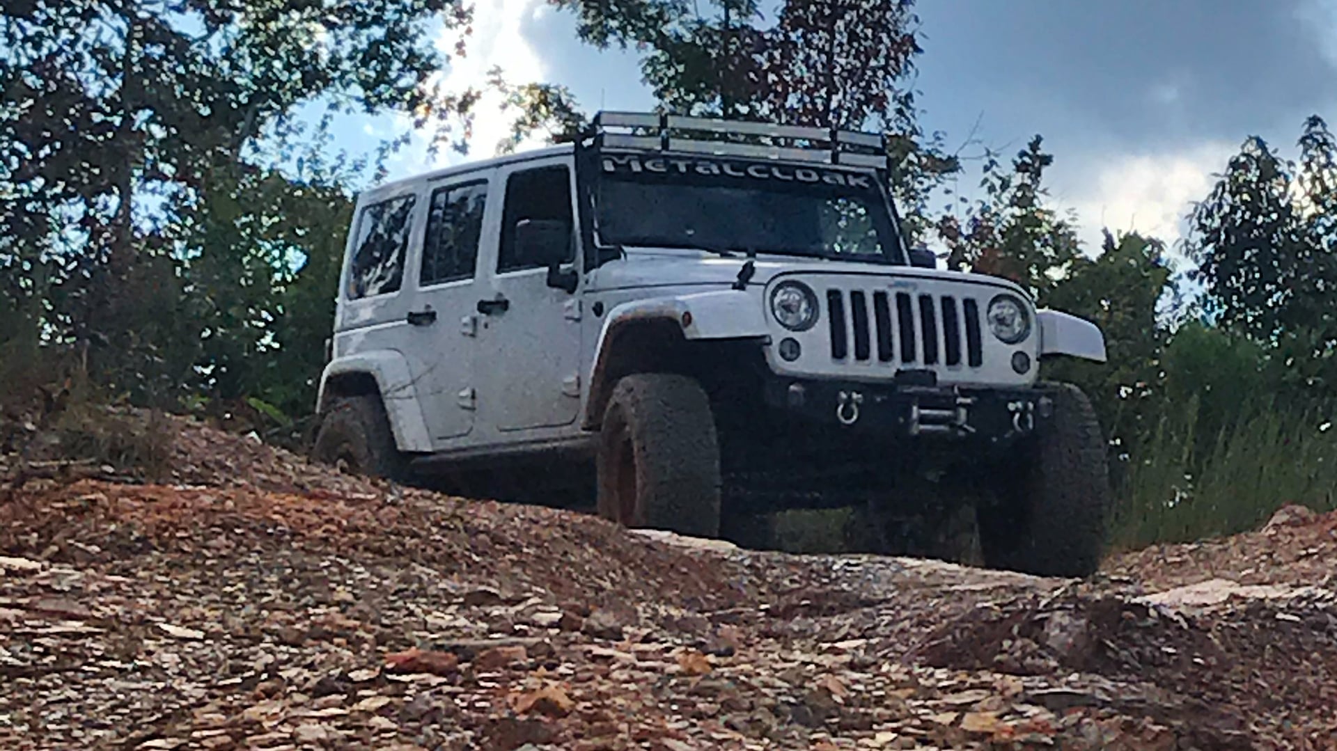 Jeep JKU, a white 2018 Jeep Wrangler JKU on 35-inch tires with a 3.5-inch lift, photo 26 of 30