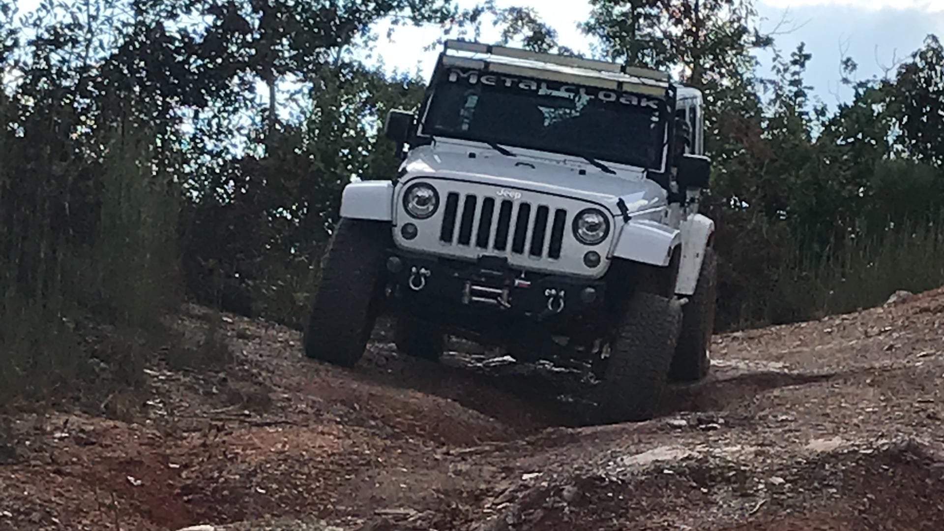 Jeep JKU, a white 2018 Jeep Wrangler JKU on 35-inch tires with a 3.5-inch lift, photo 28 of 30
