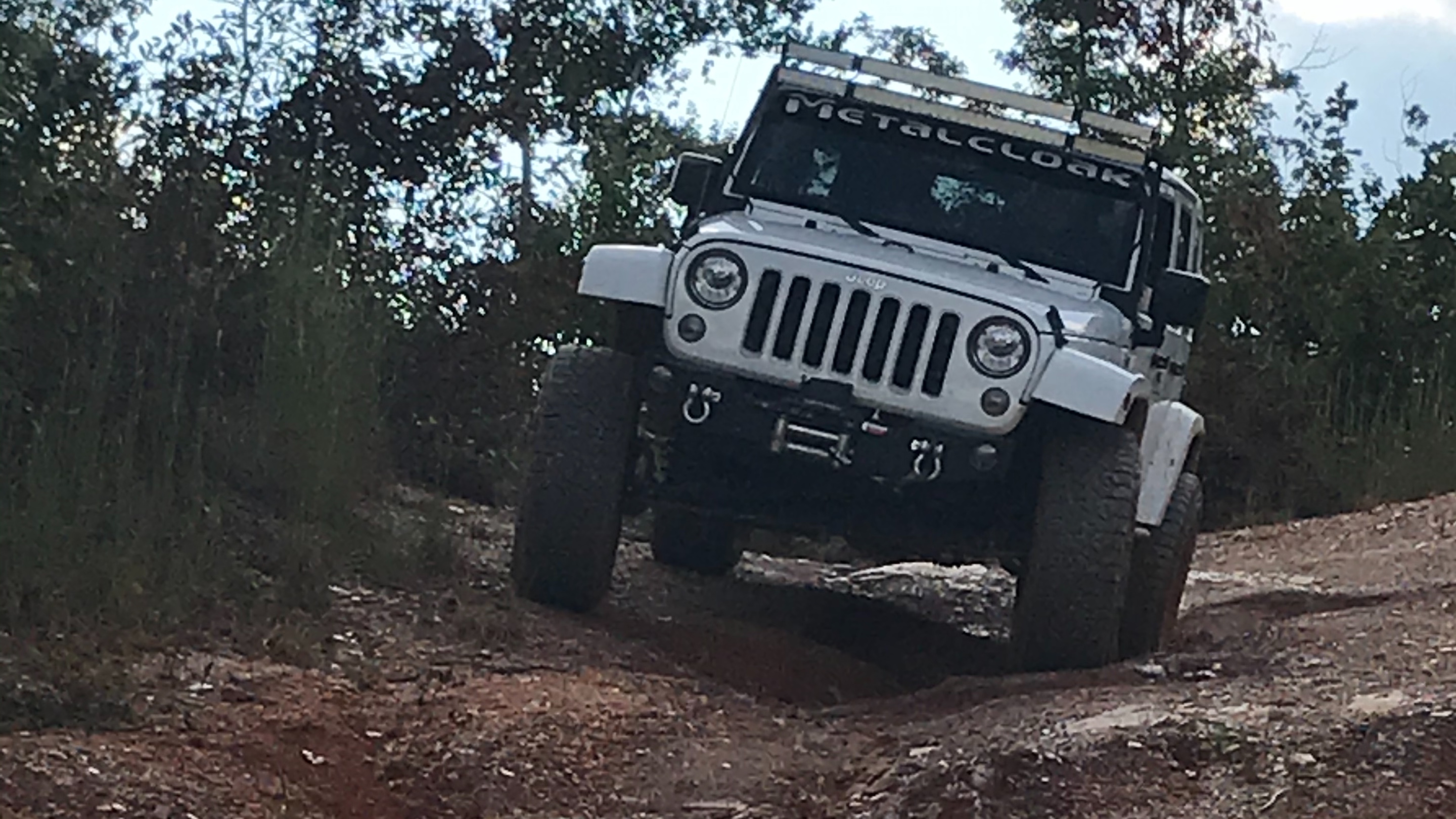Jeep JKU, a white 2018 Jeep Wrangler JKU on 35-inch tires with a 3.5-inch lift, photo 27 of 30
