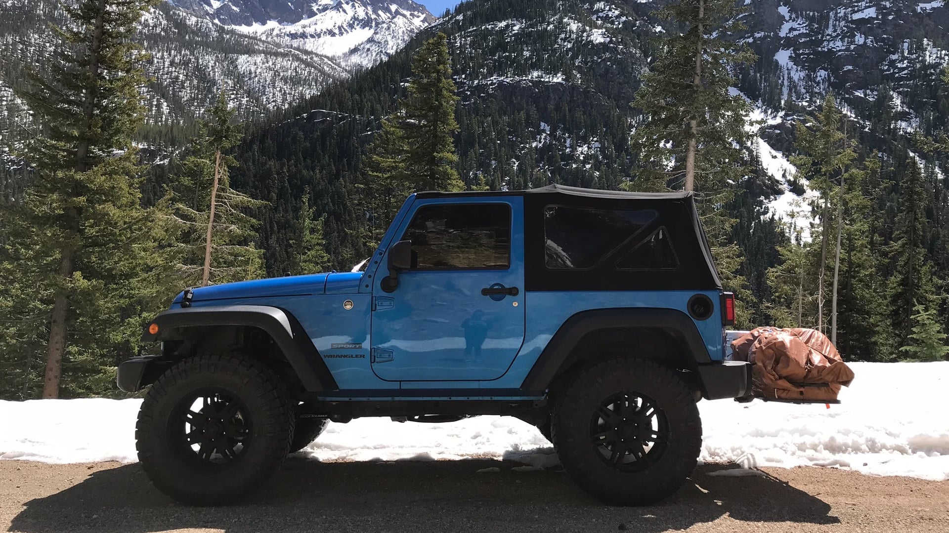 Some blue Jeep photo 11